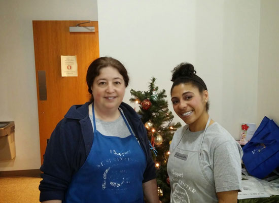 two women volunteers ready for christmas
