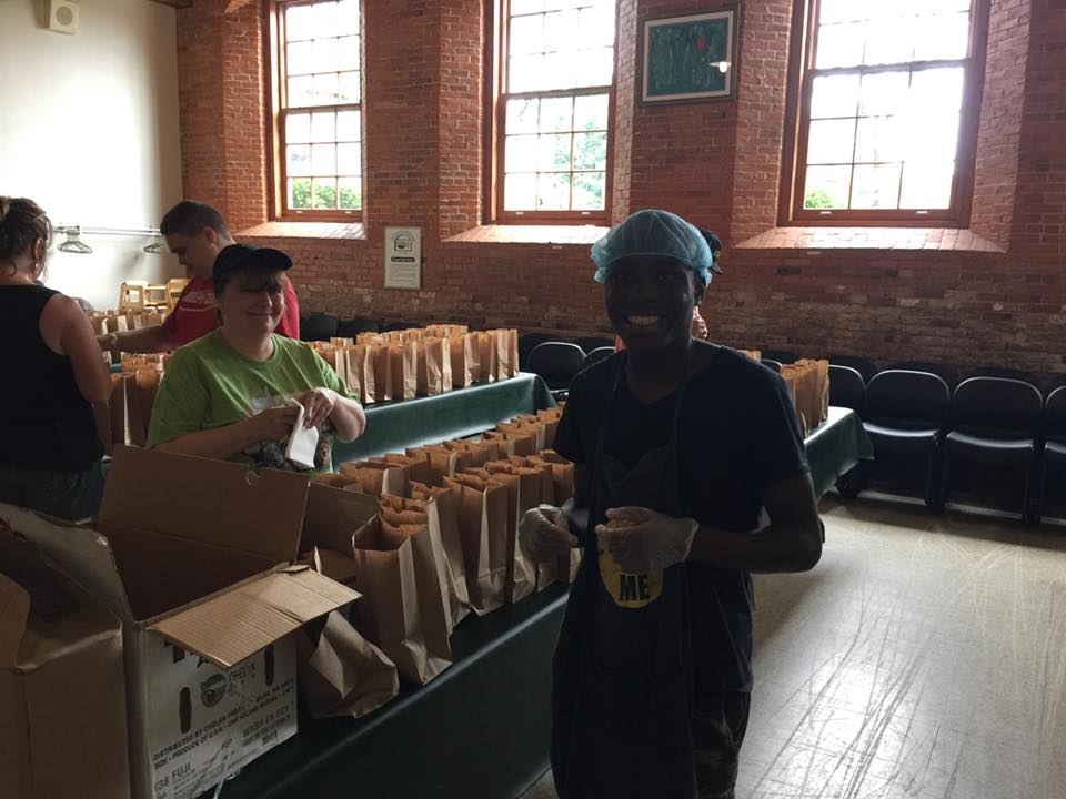 volunteers packing lunches