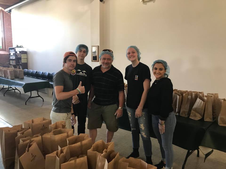 volunteers bagging lunches