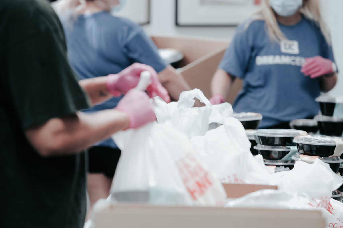 volunteers bagging food