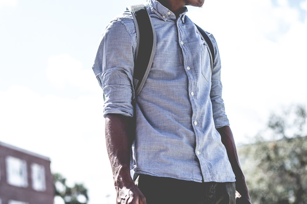 person with blue button down